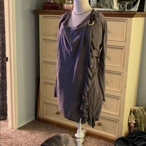 Beige sweater with leather strap